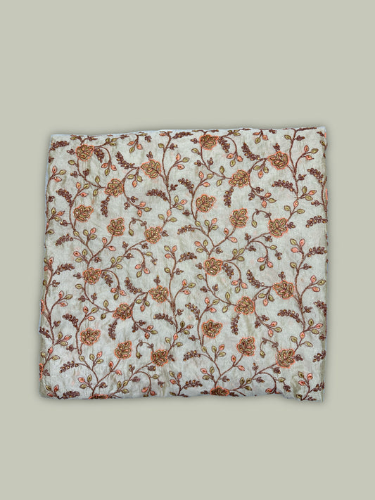 Peachy beige embroidered muslin fabric